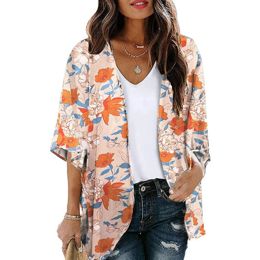 Cardigan de plage — Fleurs orange sur pêche