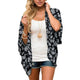 Cardigan de plage — Fleurettes blanches sur noir